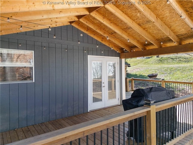 deck with grilling area and french doors