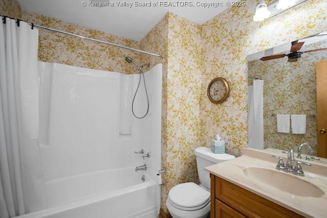 full bath with toilet, shower / bath combo, vanity, and wallpapered walls