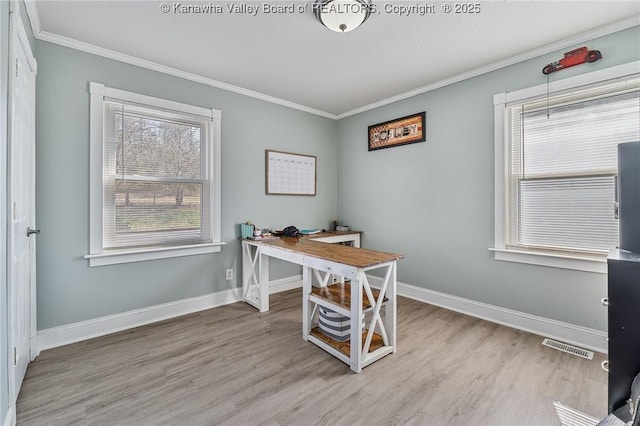 home office featuring wood finished floors, baseboards, and ornamental molding