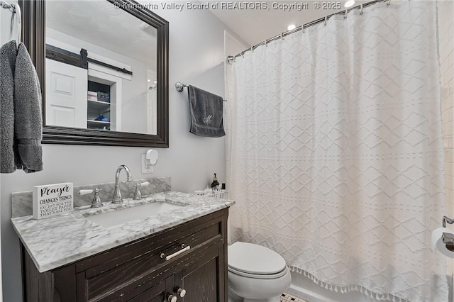 full bath with shower / bath combination with curtain, toilet, and vanity