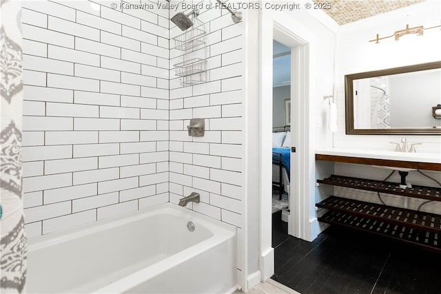 bathroom with shower / bath combo with shower curtain and vanity