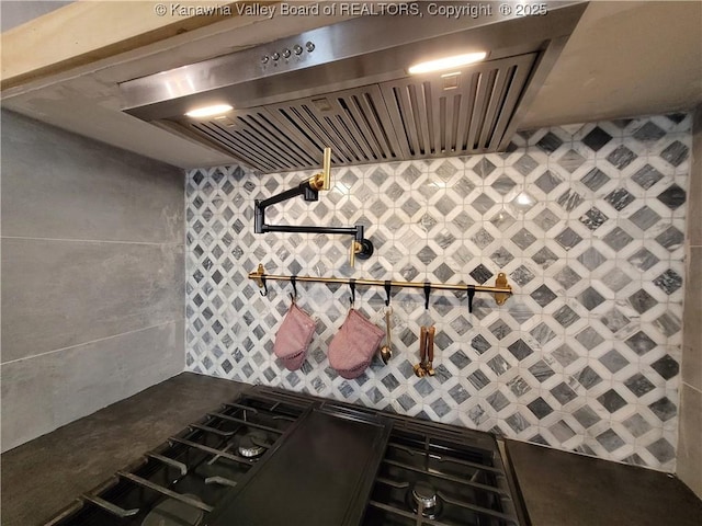 kitchen with wall chimney exhaust hood