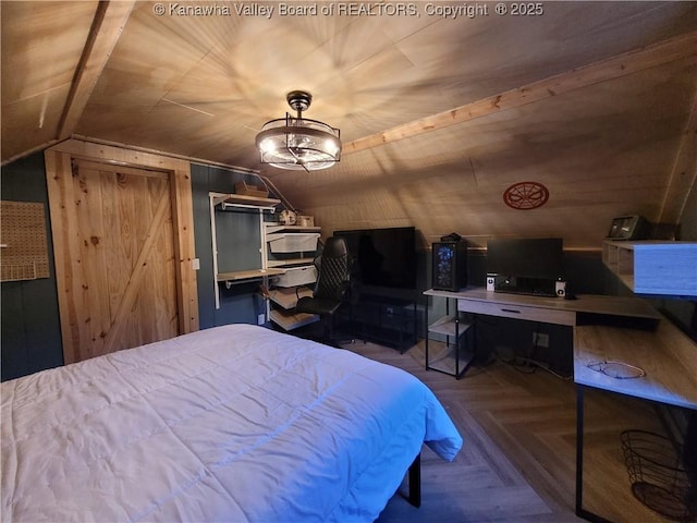 bedroom with vaulted ceiling