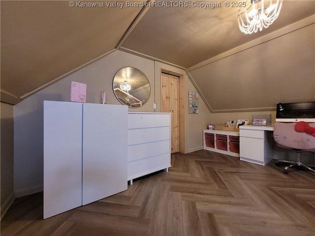 home office featuring lofted ceiling