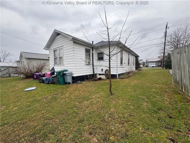 view of property exterior featuring a yard