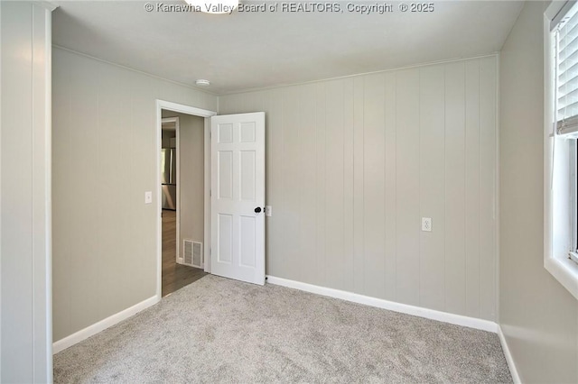 interior space featuring visible vents and baseboards