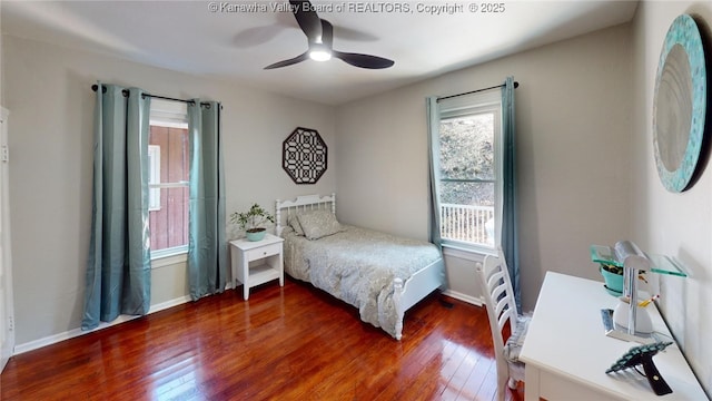 bedroom with baseboards, wood-type flooring, and ceiling fan