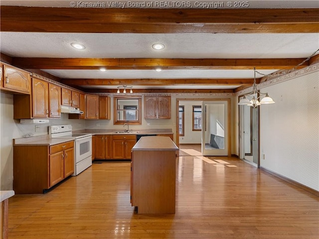 kitchen with white electric range oven, baseboards, light wood-style flooring, under cabinet range hood, and a textured ceiling