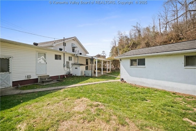 view of yard featuring entry steps