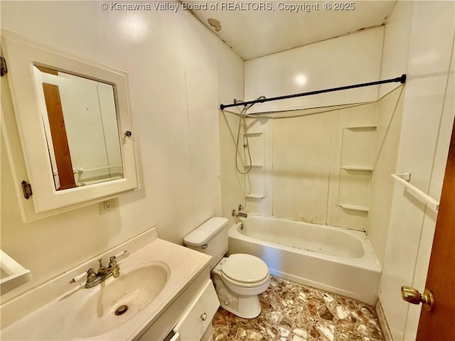 bathroom with toilet, vanity, and bathing tub / shower combination