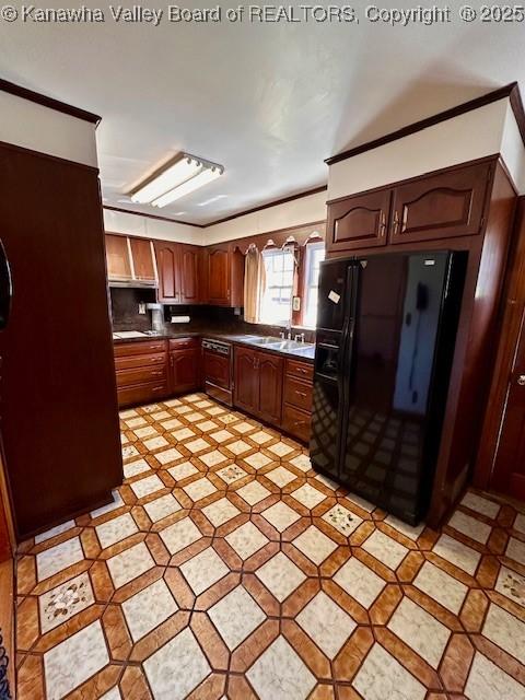 kitchen with dark countertops, ornamental molding, dishwashing machine, black refrigerator with ice dispenser, and a sink