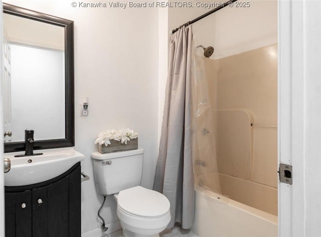 full bathroom with vanity, toilet, and shower / bath combo with shower curtain