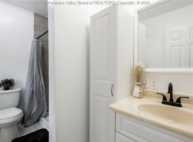 bathroom with tile patterned floors, curtained shower, toilet, and vanity