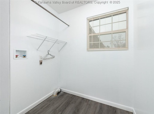 washroom with hookup for a washing machine, dark wood-style floors, baseboards, hookup for an electric dryer, and laundry area