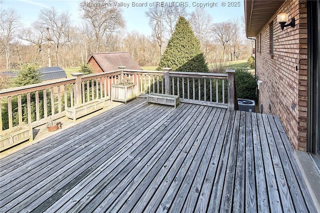 deck featuring central AC unit