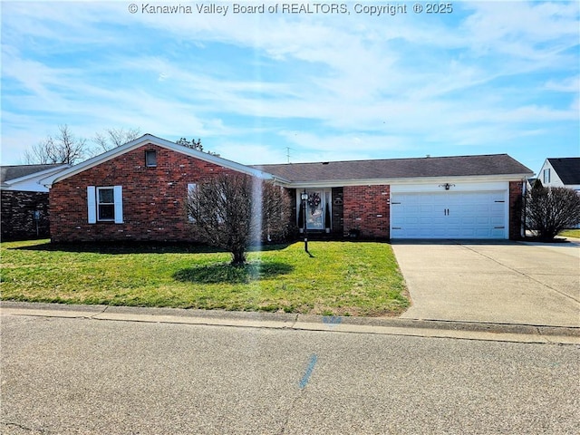 single story home with a front lawn, a garage, brick siding, and driveway