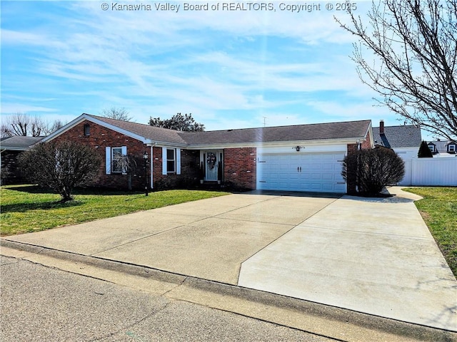 ranch-style house featuring fence, concrete driveway, an attached garage, a front yard, and brick siding