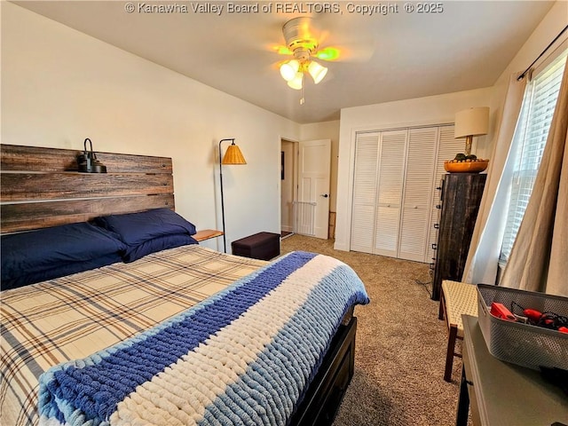 bedroom with a ceiling fan, carpet, and a closet