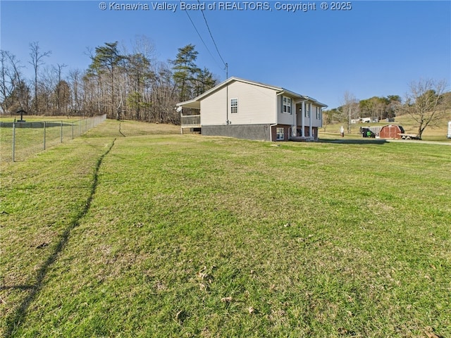 view of yard featuring fence