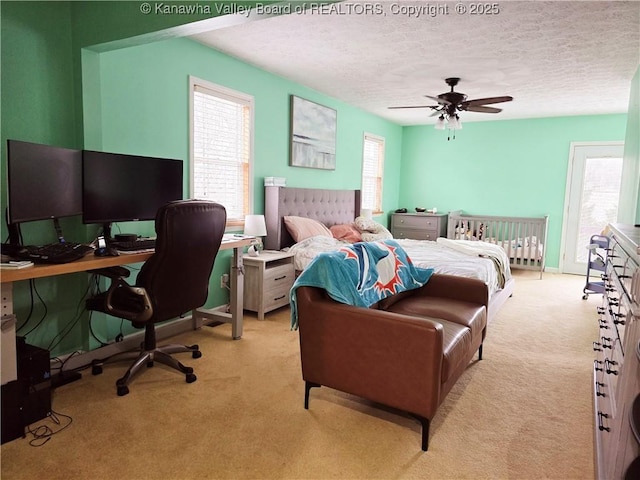 carpeted bedroom featuring multiple windows, radiator heating unit, and a textured ceiling