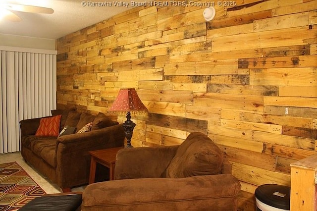 2106 Kanawha Blvd E Unit 601, Charleston, WV 25311 - living room with wooden walls, carpet, and a ceiling fan