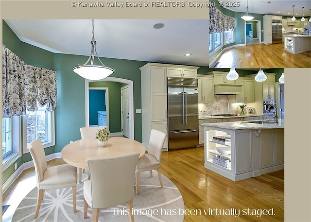 111 Graff Ln, Charleston, WV 25304 - dining area featuring light wood-style flooring, arched walkways, baseboards, and recessed lighting