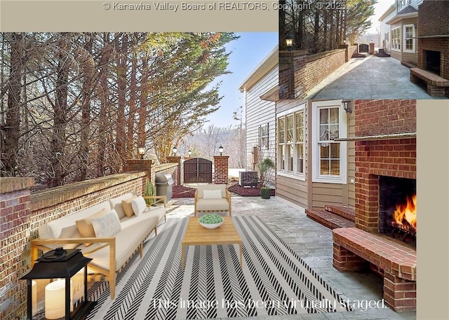 111 Graff Ln, Charleston, WV 25304 - wooden deck with an outdoor living space with a fireplace and a patio