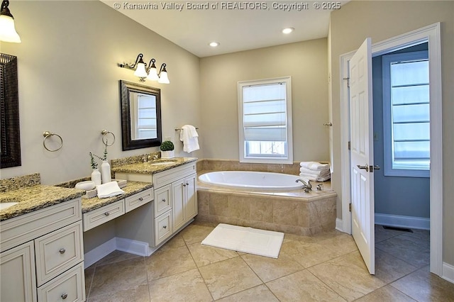 111 Graff Ln, Charleston, WV 25304 - bathroom with vanity, a garden tub, tile patterned floors, and baseboards