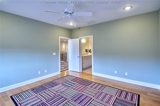 111 Graff Ln, Charleston, WV 25304 - unfurnished bedroom with light wood-type flooring, baseboards, ensuite bathroom, a ceiling fan, and recessed lighting