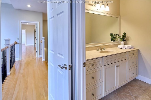 111 Graff Ln, Charleston, WV 25304 - bathroom featuring vanity, baseboards, and wood finished floors