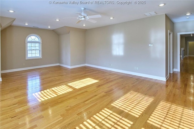 111 Graff Ln, Charleston, WV 25304 - spare room with light wood finished floors, ceiling fan, baseboards, vaulted ceiling, and recessed lighting