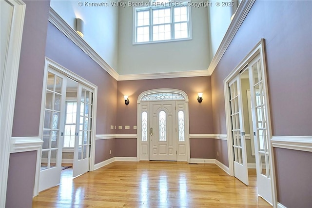 111 Graff Ln, Charleston, WV 25304 - foyer with french doors, a high ceiling, plenty of natural light, and wood finished floors