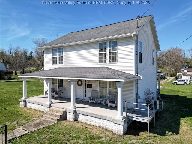 1737 US Route 60 W, Milton, WV 25541 - rear view of property featuring covered porch, a shingled roof, and a yard