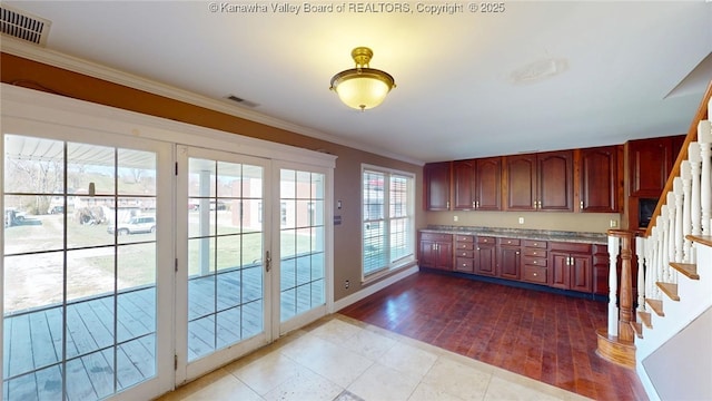 1737 US Route 60 W, Milton, WV 25541 - kitchen featuring visible vents, baseboards, ornamental molding, and light countertops