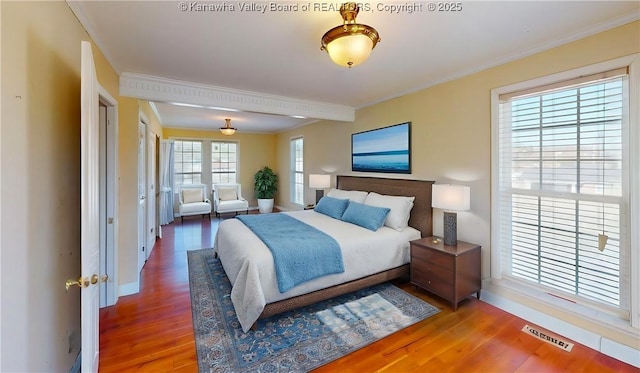 1737 US Route 60 W, Milton, WV 25541 - bedroom with crown molding, wood finished floors, visible vents, and baseboards