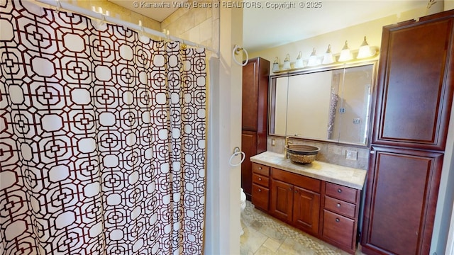 1737 US Route 60 W, Milton, WV 25541 - bathroom featuring a shower with shower curtain, vanity, and stone finish flooring
