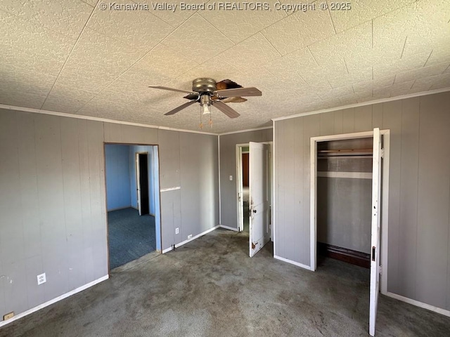 2509 Adams Ave, Huntington, WV 25704 - unfurnished bedroom with a ceiling fan, baseboards, carpet floors, ornamental molding, and a closet