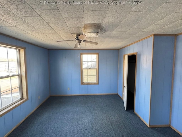 2509 Adams Ave, Huntington, WV 25704 - unfurnished bedroom with ceiling fan and carpet floors