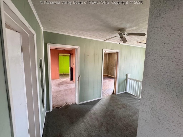 2509 Adams Ave, Huntington, WV 25704 - unfurnished room featuring carpet, ceiling fan, a textured ceiling, crown molding, and a textured wall