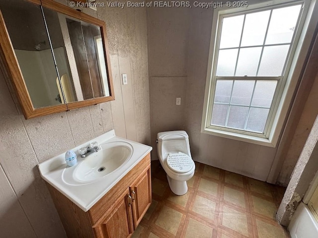 2509 Adams Ave, Huntington, WV 25704 - bathroom featuring tile patterned floors, toilet, and vanity