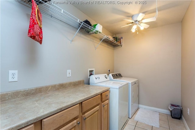 laundry area with washer and dryer, baseboards, a ceiling fan, cabinet space, and light tile patterned floors