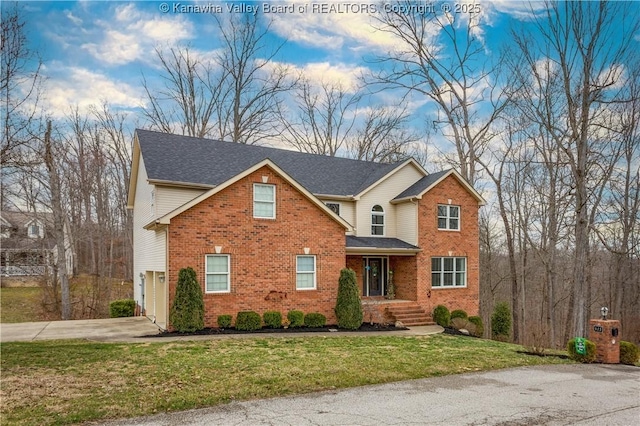 traditional-style home with a front yard, roof with shingles, brick siding, concrete driveway, and an attached garage