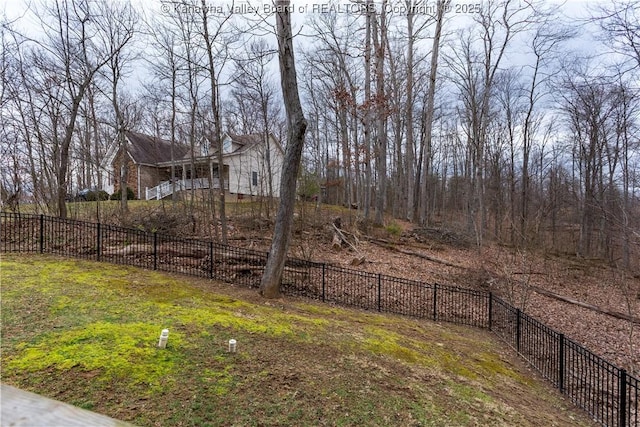 view of yard featuring fence