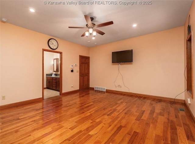 356 Latigo Pt, Milton, WV 25541 - unfurnished living room featuring ceiling fan, light wood finished floors, and recessed lighting