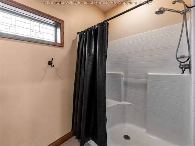 356 Latigo Pt, Milton, WV 25541 - bathroom with curtained shower and tile patterned flooring