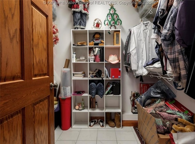 356 Latigo Pt, Milton, WV 25541 - spacious closet featuring tile patterned flooring