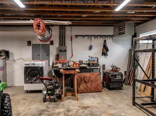 356 Latigo Pt, Milton, WV 25541 - below grade area featuring separate washer and dryer and a workshop area