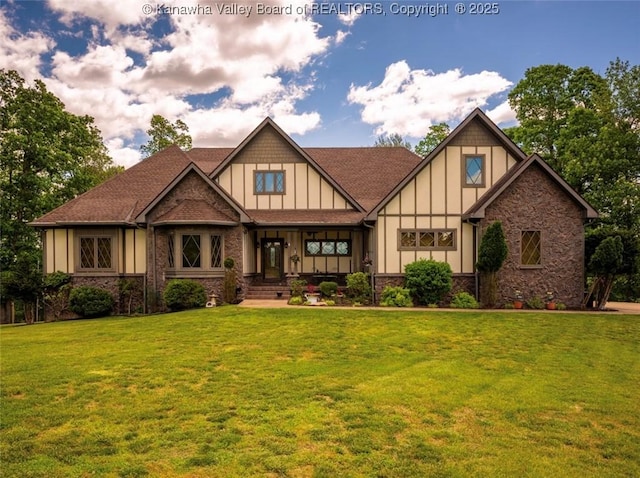356 Latigo Pt, Milton, WV 25541 - tudor-style house featuring board and batten siding, a front lawn, stone siding, and roof with shingles