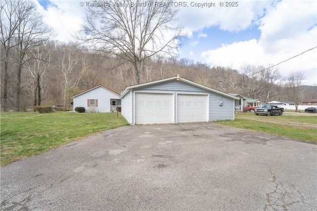 view of detached garage
