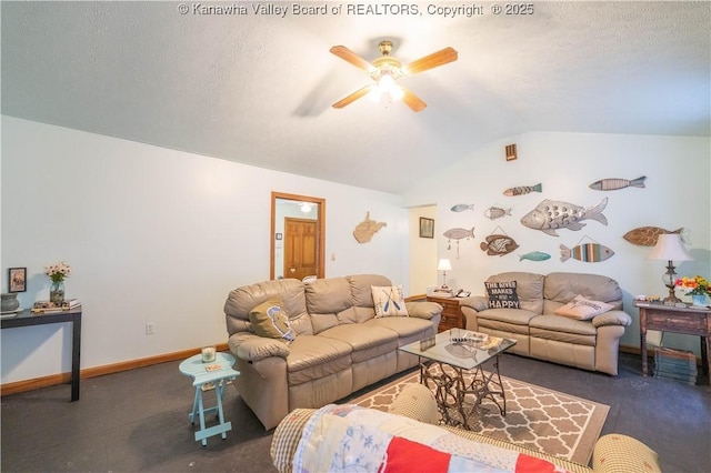 living room with a textured ceiling, ceiling fan, baseboards, and vaulted ceiling